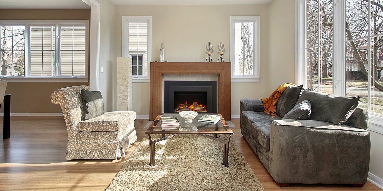 Ambiance® 34 Electric Fireplace Insert in a warm family room.