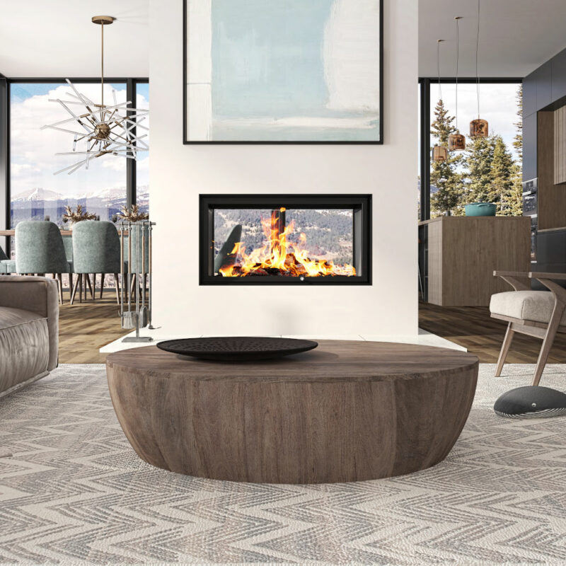 LUXUS® 40 See-Thru Guillotine Wood Fireplace in a modern cabin.